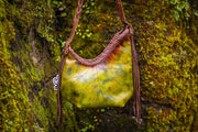 Asymmetrical Leather Hobo Bag Featuring 3D Organic Leaves and Long Fringe - Lotus Leather