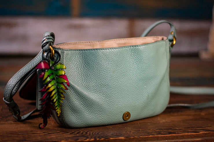 Unique Fossil Upcycled Light Blue Leather Crossbody: Artistic Hummingbird & Protea Design with Fern Charm - Lotus Leather