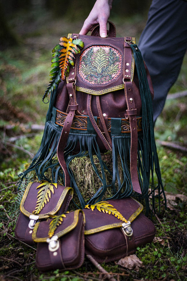 handcrafted woodland leather backpack customizable with modular detachable pockets